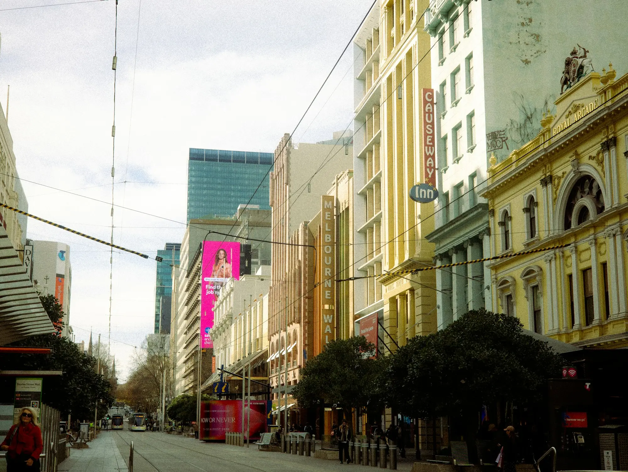 Heritage commercial buildings with ground-floor shops and upper-level tenancies along Bourke Street Mall, Melbourne